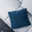 Blue cushion cover with delicate butterfly smocking design