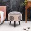 Blue ottoman stool with ethnic embroidery and intricate patterns