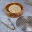 Silver lidded roti box with a sleek, traditional design