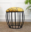 Yellow abstract-patterned metallic stool with a cage-style black base