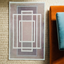 Hand-tufted rectangular wool carpet with intricate design