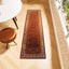 Vintage Persian wool runner rug in rich red, perfect for hallways