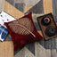 Chinar embroidered maroon cushion cover with elegant design