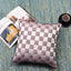 Vintage purple cushion cover with intricate self-design pattern