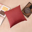 Plain maroon sofa cushion cover with a soft and smooth texture