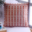 Orange cotton cushion cover with intricate embroidered design