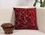 Maroon cushion cover with embroidered triangle design