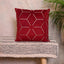 Prism embroidered red cushion cover with intricate design