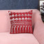 Char Minar design maroon cushion cover with decorative pattern