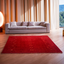 Lori Loom maroon carpet with a soft texture and elegant design