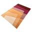 Hand-tufted wool rug with geometric design in warm earthy tones