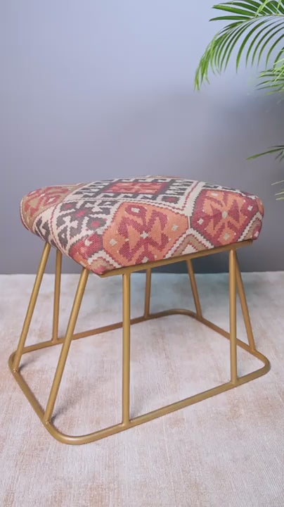 Rust geometric jute-cotton stool with metallic gold base